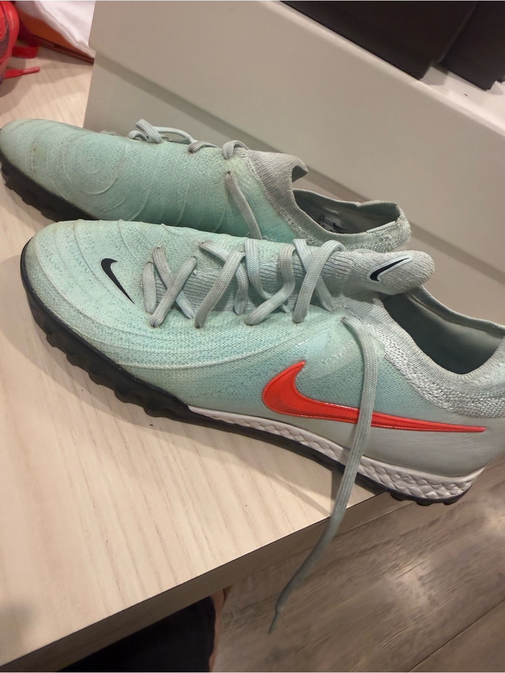 Nike Mint Green Athletic Sneakers with Orange Swoosh